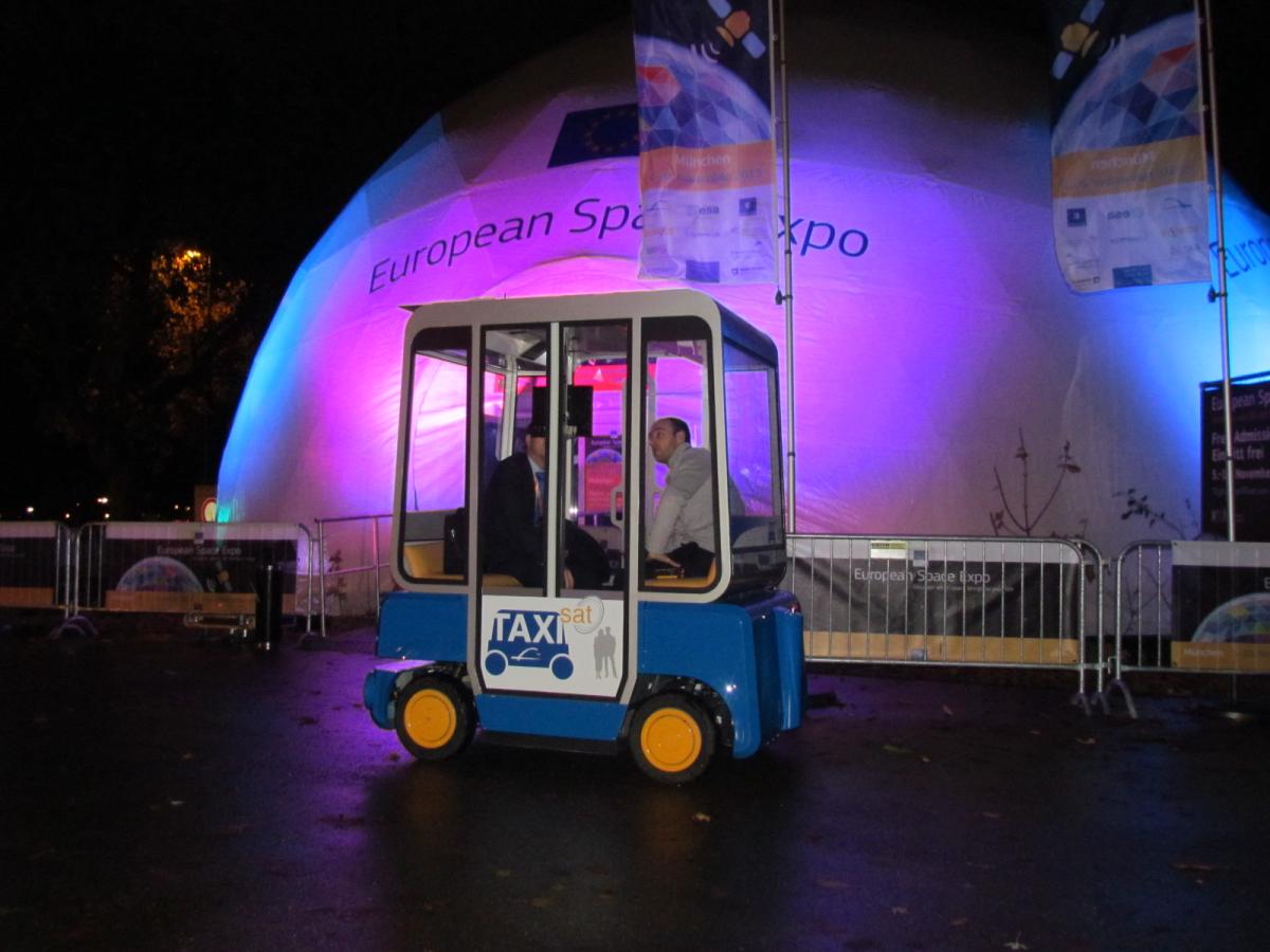 TaxiSat outside the Expo © Reynolds